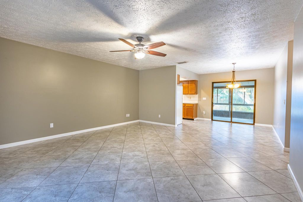 Photo of 1008 NE Kubin Avenue, Jensen Beach, FL 34957 (MLS # R11017007)
