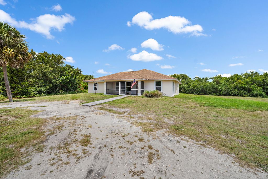 Photo of 8251 SE Dharlys Street, Hobe Sound, FL 33455 (MLS # R10811117)