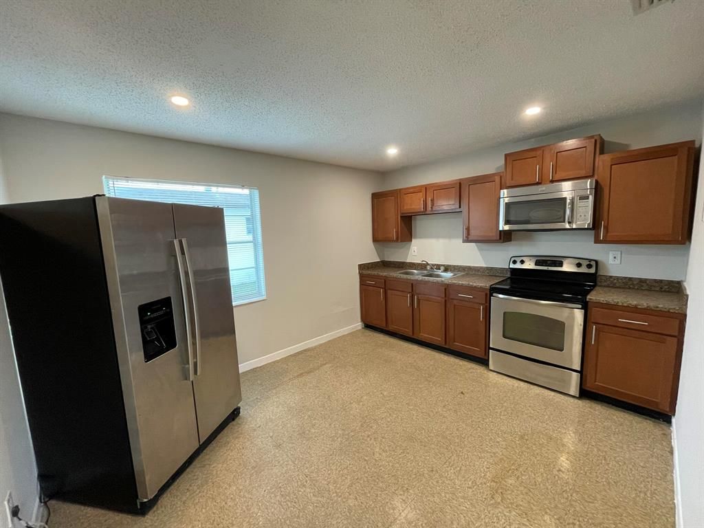 Photo of 3469 Hi Street St, Lake Worth Beach, FL 33461 (MLS # R10763385)