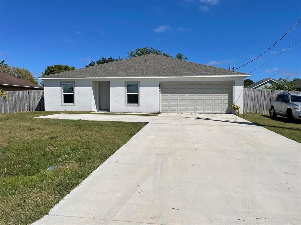 Photo of 1205 SW Alcantarra Boulevard, Port Saint Lucie, FL 34983 (MLS # R10878127)