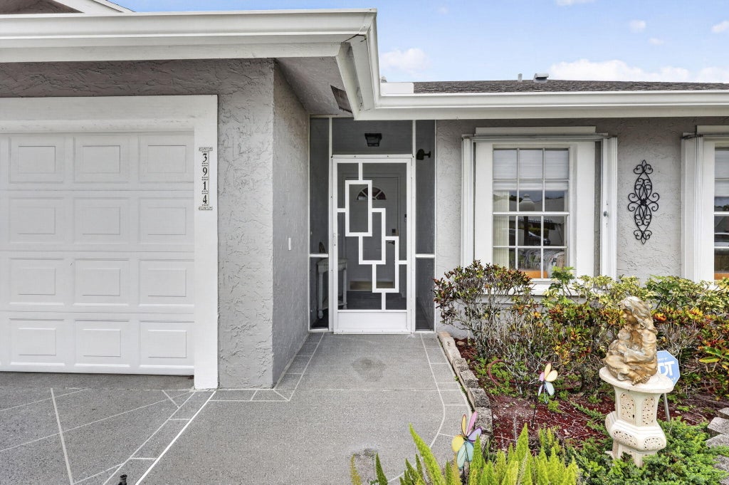 Photo of 3914 Dafilee Circle, West Palm Beach, FL 33417 (MLS # B26081709)