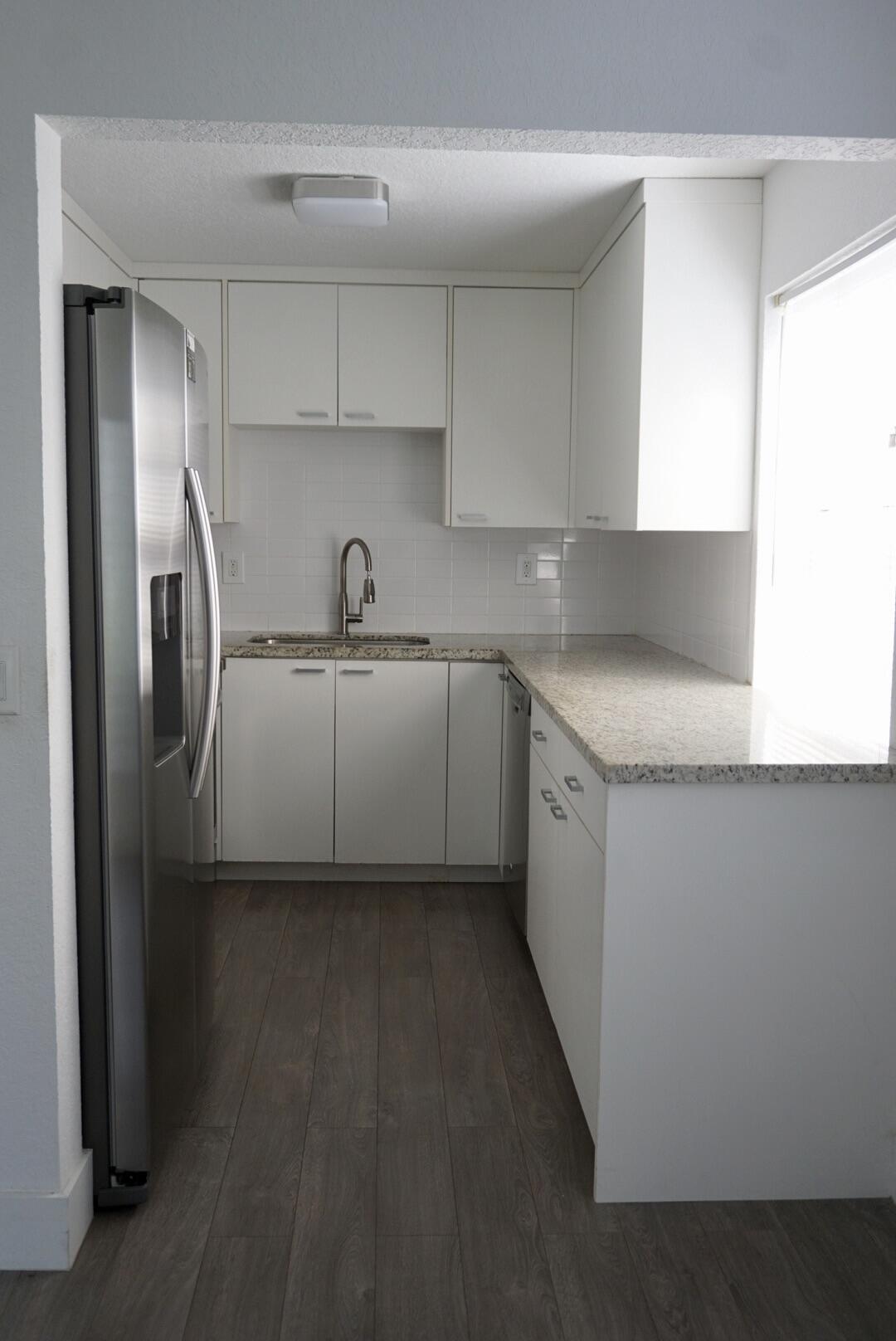 Kings Point Burgundy Condos - Residential