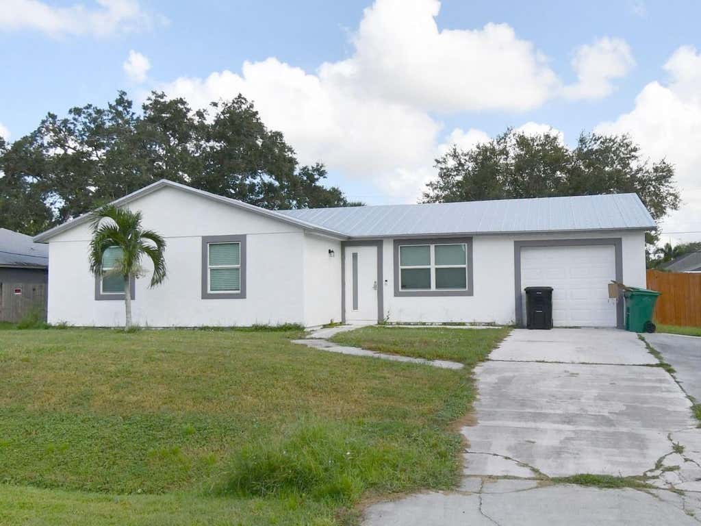 Photo of 1137 SW Colorado Avenue, Port Saint Lucie, FL 34953 (MLS # F10434586)