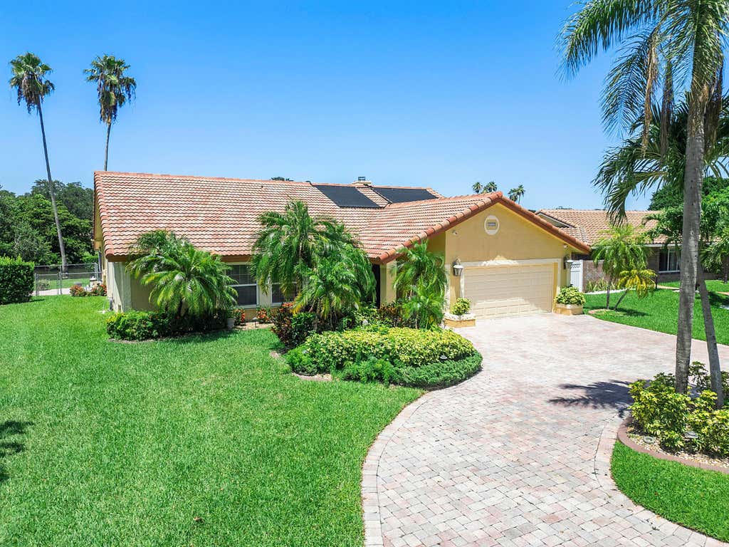 Photo of 8719 NW 1ST Street, Coral Springs, FL 33071 (MLS # B26063903)