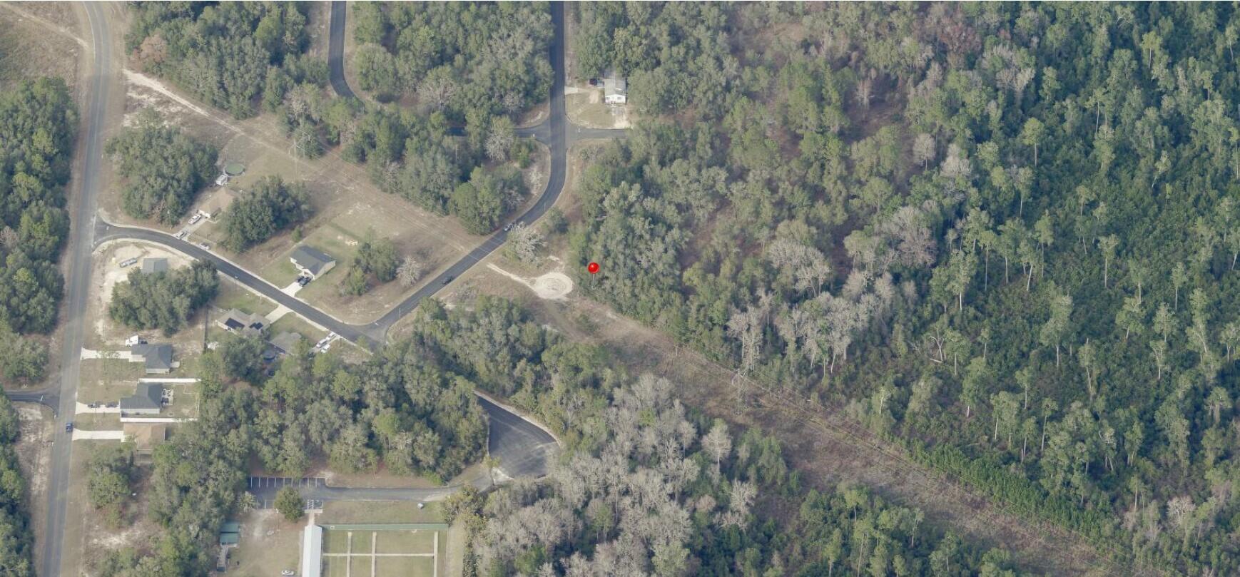 Discover the perfect opportunity to own nearly 0.88 acres of vacant land in the growing Silver Springs Shores community. Nestled in a quiet, residential area with paved road access and no HOA, you'll enjoy the peace of country-style living just minutes from Ocala's shops, restaurants, and schools. Whether you're ready to build now or invest for the future, this lot is priced to sell and offers fantastic potential. Don't miss this rare opportunity to own a large lot in one of Marion County's most desirable up-and-coming areas. For directional purposes please use 7 LOCUST TRAK.