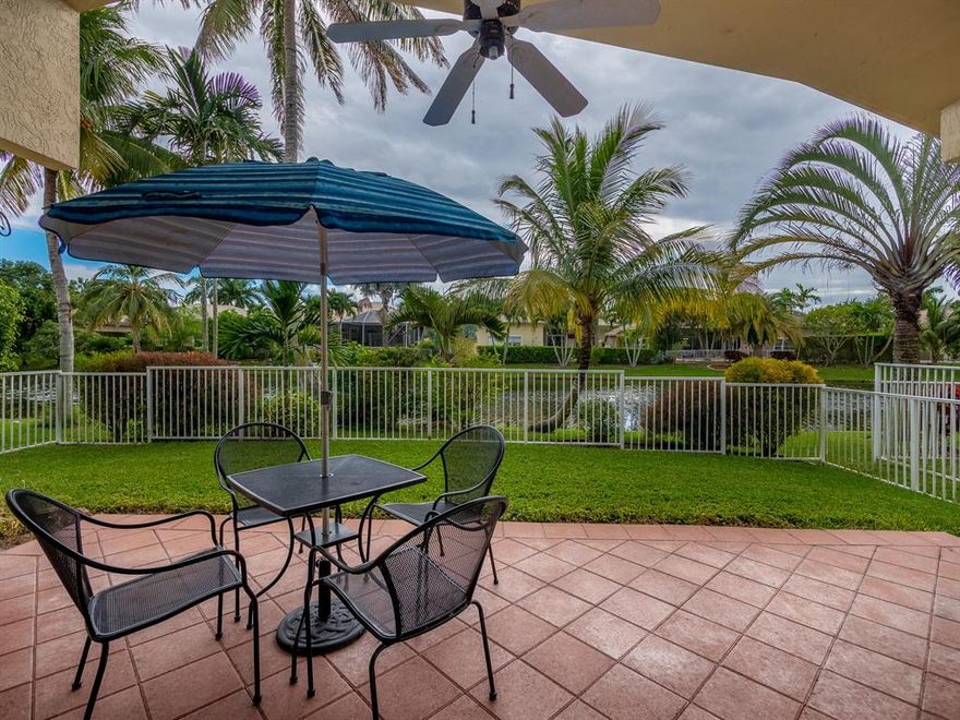 Stunning and rarely available 3 bedroom, 2 bathroom waterfront home in Mayfair of Wyndham Lakes.  Relax in your tropical retreat like backyard featuring a large covered patio, fenced in yard with wide views of the water. The open floor plan offers volume ceilings, split bedrooms and grand sized owner's suite. The Mayfair community have low HOA fees that also include a community pool.  Definitely a must see!