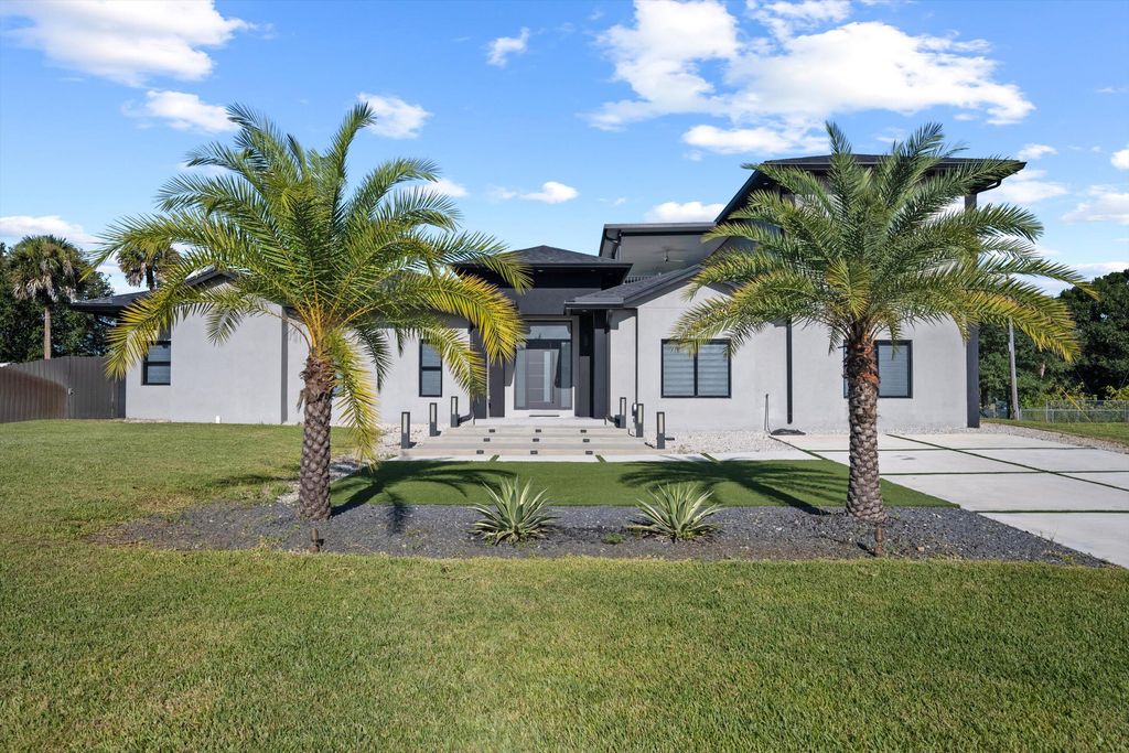 Photo of 641 Marshall Road, West Palm Beach, FL 33413 (MLS # R11113378)