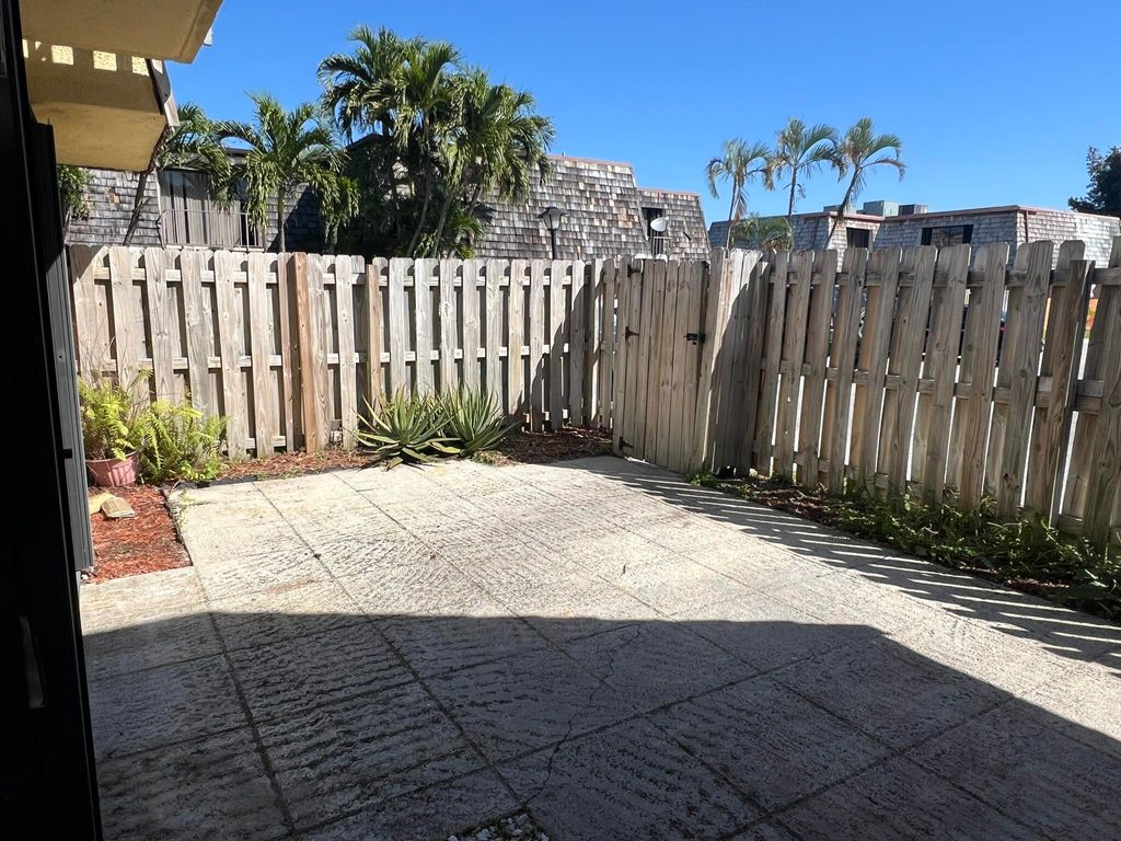 Photo of 99 Lake Arbor Drive, Palm Springs, FL 33461 (MLS # R10953238)