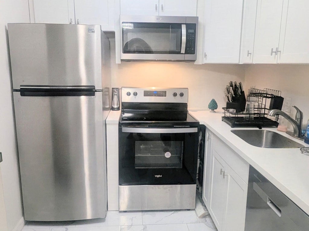 Photo of 360 Windsor P, West Palm Beach, FL 33417 (MLS # B26073077)