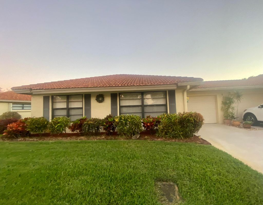 Photo of 9840 Clusia Tree Drive #A, Boynton Beach, FL 33436 (MLS # B26012009)