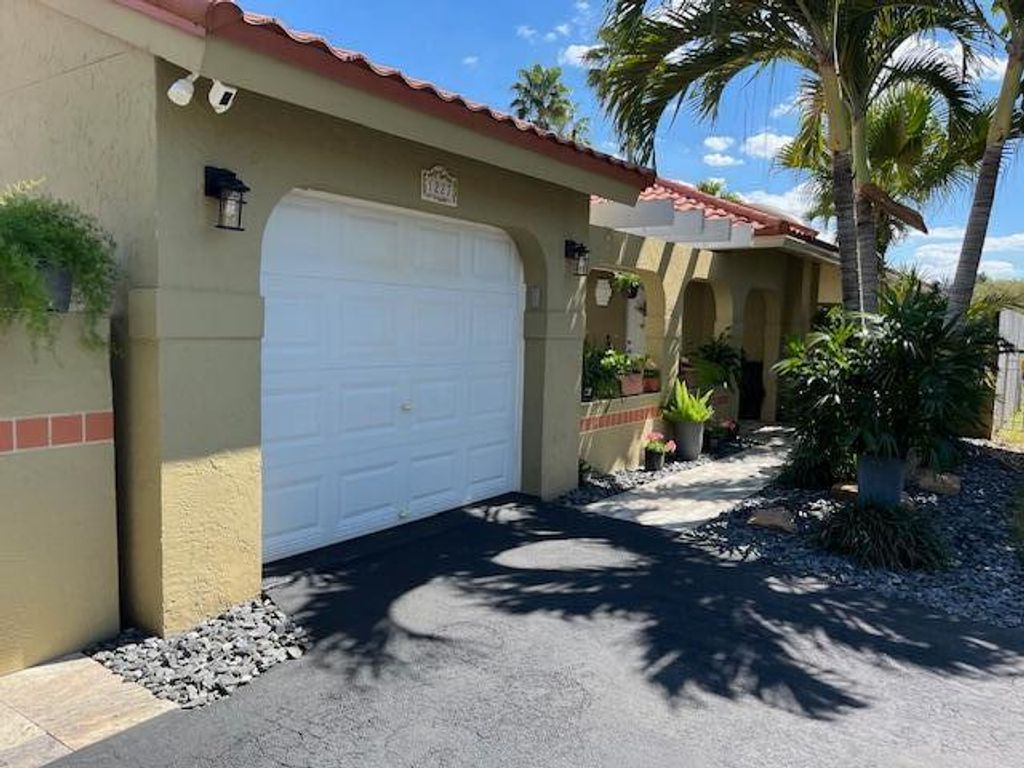 Photo of 1227 Seagrape Circle, Weston, FL 33326 (MLS # B26008780)