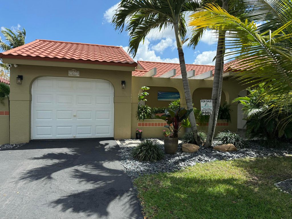 Photo of 1227 Seagrape Circle, Weston, FL 33326 (MLS # B26008780)