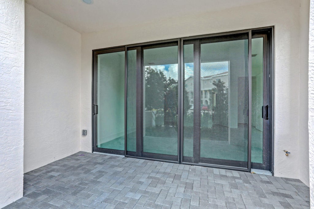 Photo of 5161 Beckman Ter, Palm Beach Gardens, FL 33418 (MLS # R10935254)