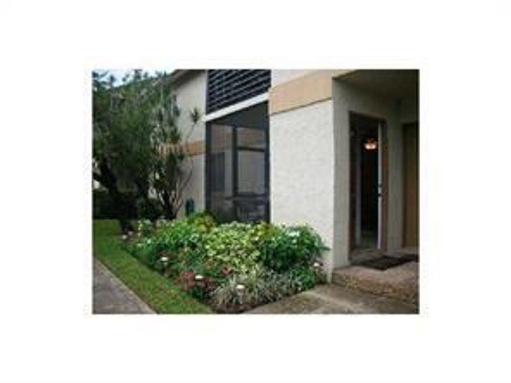 Photo of 512 Gardens Drive #103, Pompano Beach, FL 33069 (MLS # B26010818)