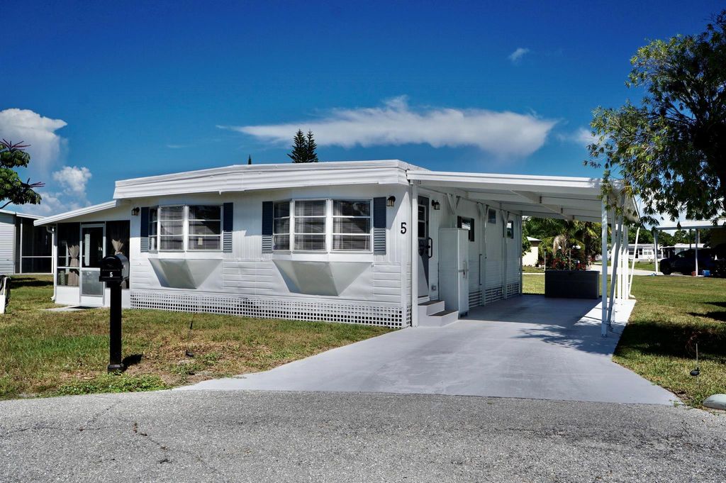 Photo of 5 Ventura Lane, Port Saint Lucie, FL 34952 (MLS # R11117176)