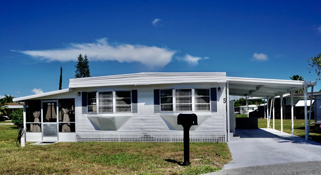 Photo of 5 Ventura Lane, Port Saint Lucie, FL 34952 (MLS # R11117176)