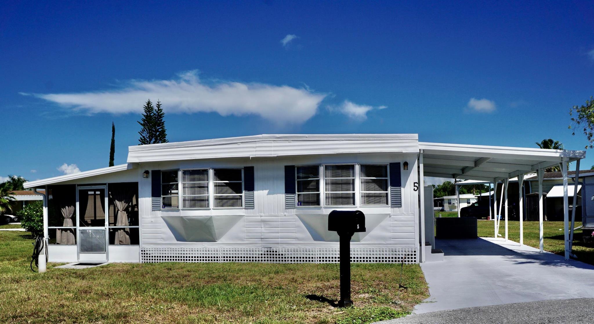 NEW! NEW! NEW! This is a MUST SEE IT TO BELIEVE IT! This home has been remodeled from roof to floor! 2025 New Rolled Roof. 2024 COMPLETE REMODEL! 2024 NEW AC Installed. 2024 New SS Appliances. 2024 New Luxury Vinyl Flooring throughout entire home. 2024 New Plumbing Fixtures. 2024 New Toilets. 2024 New Skirting. 2024 New Screen on the porch. (Tiny Screen to keep out even the smallest bugs...no-see-ums). 2020 New Hot Water Heater. 2024 & 2025 Inside & Outside Painted. Even has a brand new mailbox! Home is being sold completely FURNISHED minus personal items. Includes 75in TV! If furniture isn't wanted, we can work that out as well. Located on a very quiet cul-de-sac. This spotless home is a MUST SEE! 4 point inspection is available. Home is insurable! Schedule your appointment today!