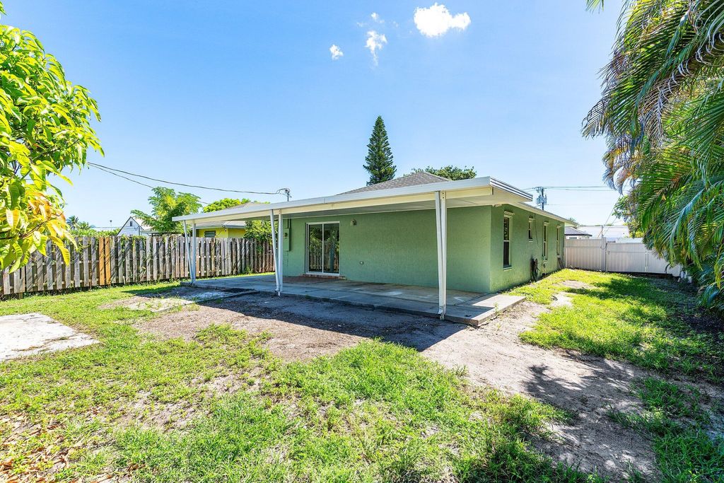 Photo of 3837 Riedel Avenue, Palm Springs, FL 33461 (MLS # R11117453)