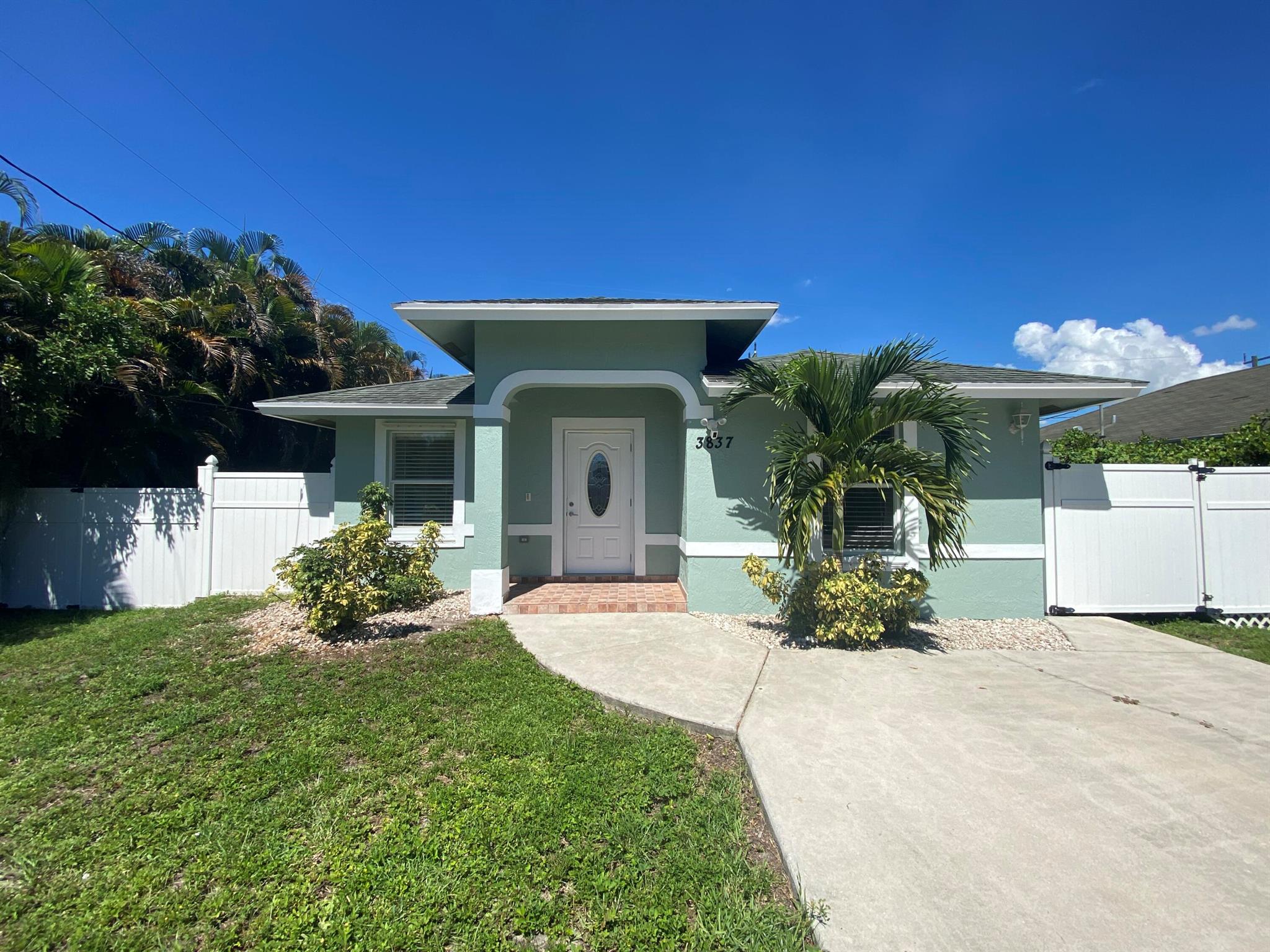Fabulous location! Walk to Lake Osborne, John Prince Park, & Palm Beach State College. 3.3 miles to Atlantic Ocean with beautiful beaches, shops & restaurants. 2 miles to downtown Lake Worth Beach. This remodeled single story home is located in Palm Springs city limits. 2-car paved driveway, large covered patio, fenced yard, shed, sprinkler system, mango tree, & room for small boat storage at side yard. A/C installed July '25. New kitchen & baths. New SS appliances, white cabinetry, granite counters & under cabinet lighting. Master BR features private bath & walk-in closet. Recessed lighting. Instant hot water heater. Interior laundry w new washer & dryer. New interior and exterior paint. Ceramic tile Flooring. City installed new storm drainage system for Riedel Ave Aug '25