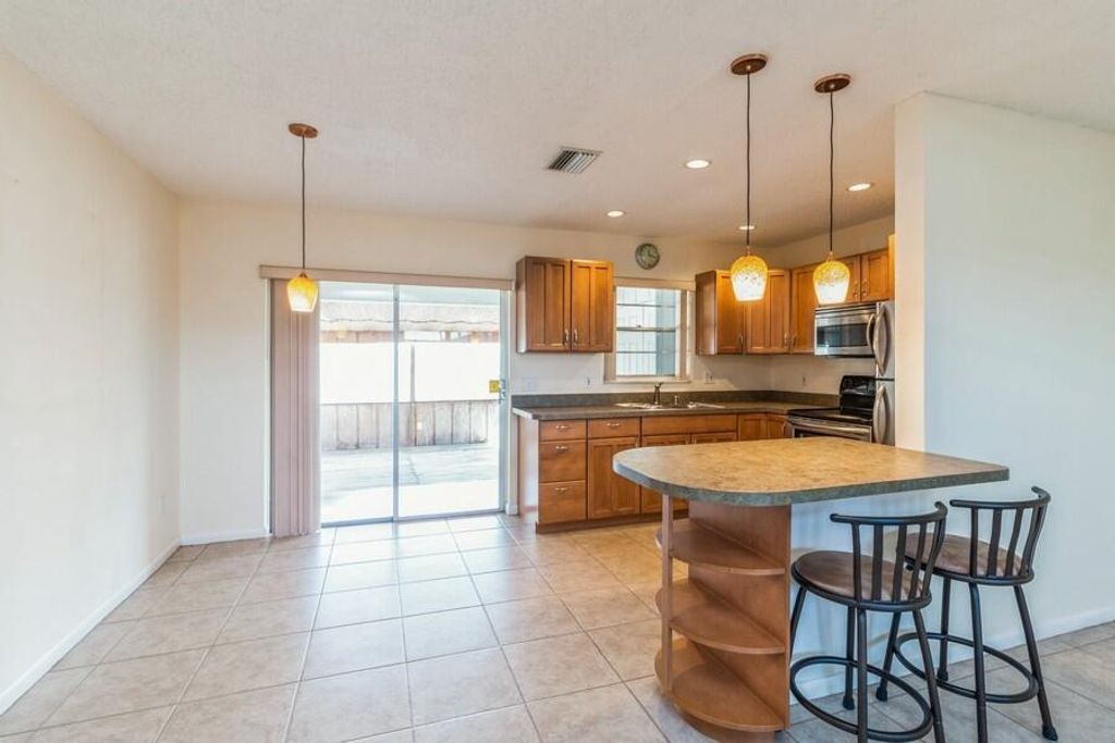 Photo of 5083 Michigan Avenue, West Palm Beach, FL 33415 (MLS # R10744404)