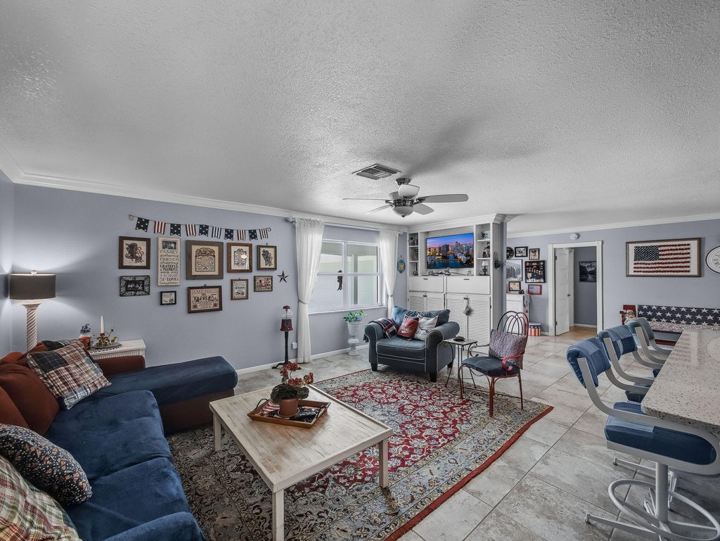 Photo of 9480 SE Little Club Way N, Jupiter, FL 33469 (MLS # R11120312)