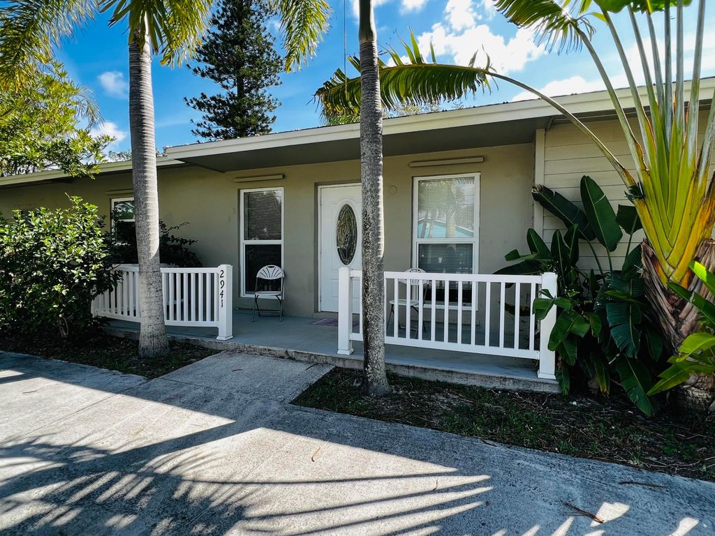 Photo of 2941 SE Treasure Island Road, Port Saint Lucie, FL 34952 (MLS # R10985765)
