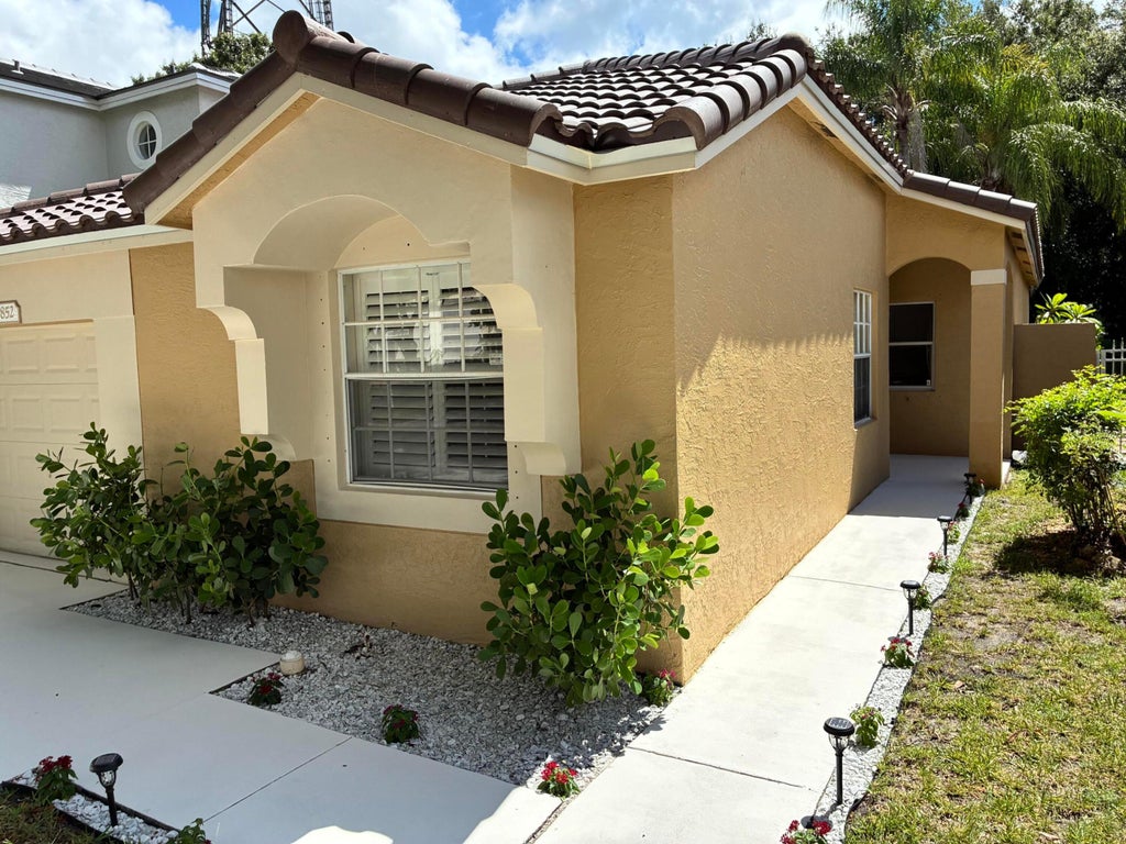 Photo of 5852 Eagle Cay Terrace, Coconut Creek, FL 33073 (MLS # R11159710)