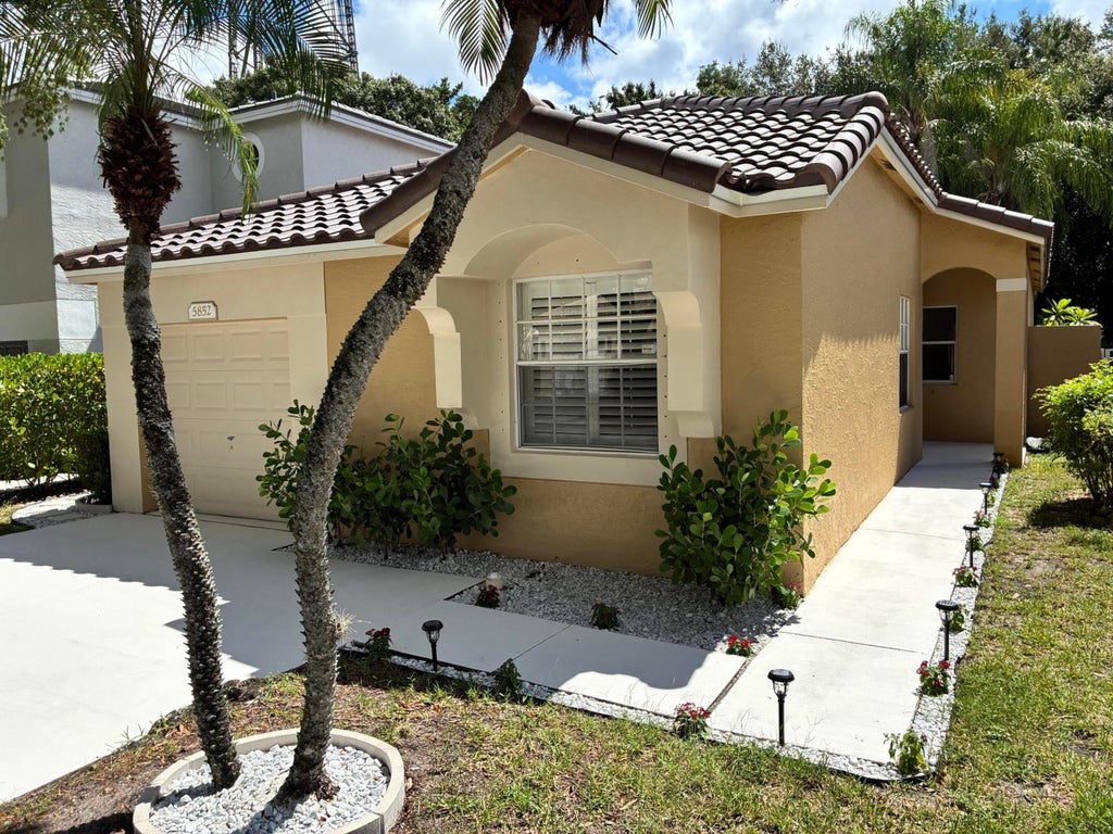 Photo of 5852 Eagle Cay Terrace, Coconut Creek, FL 33073 (MLS # R11159710)