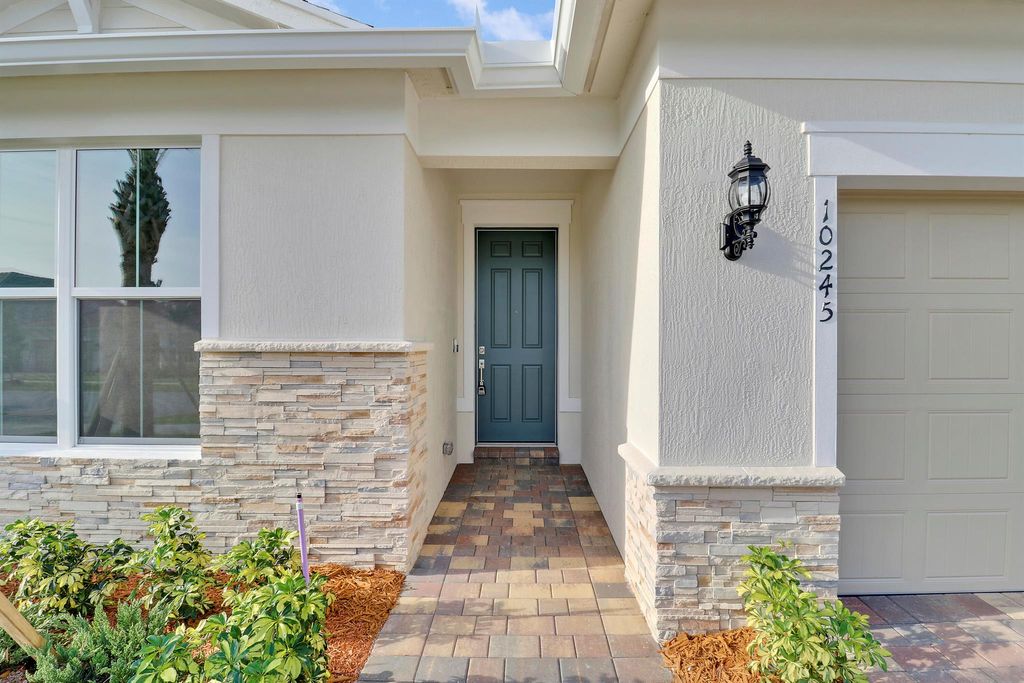Photo of 10245 SW Captiva Drive, Port Saint Lucie, FL 34987 (MLS # R11067909)