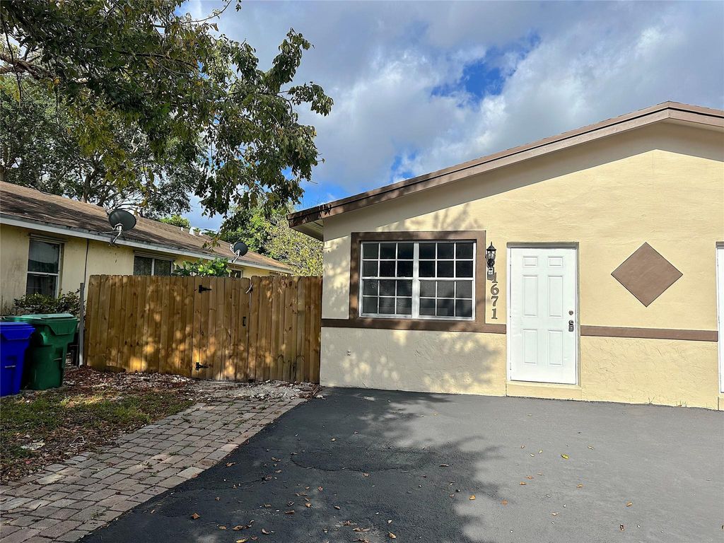 Photo of 1671 SW 44th Avenue, Fort Lauderdale, FL 33317 (MLS # F10497307)