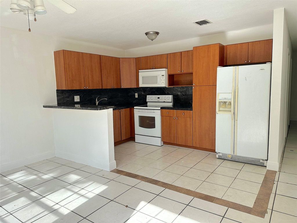 Photo of 1671 SW 44th Avenue, Fort Lauderdale, FL 33317 (MLS # F10497307)