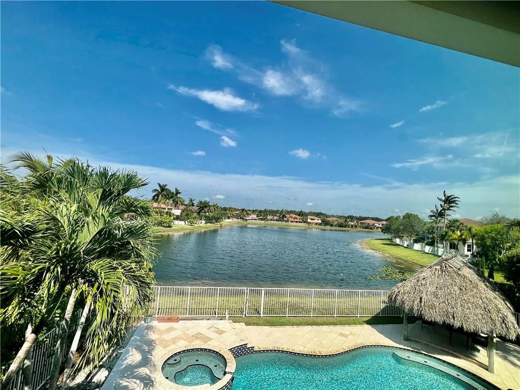Photo of 3766 W Gardenia Avenue, Weston, FL 33332 (MLS # B26029683)
