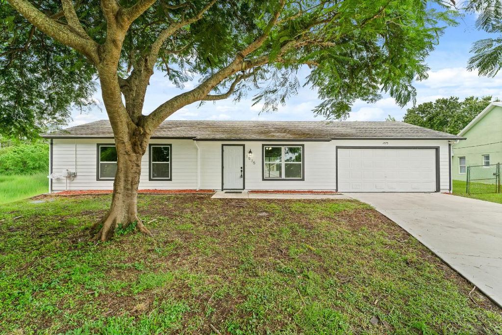 Photo of 1575 SW Fresno Road, Port Saint Lucie, FL 34953 (MLS # R11154198)