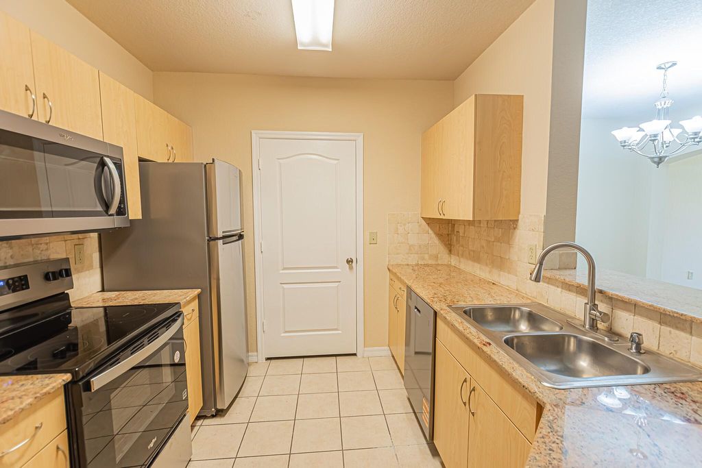 Photo of 166 SW Peacock Boulevard #34-205, Port Saint Lucie, FL 34986 (MLS # R11089480)