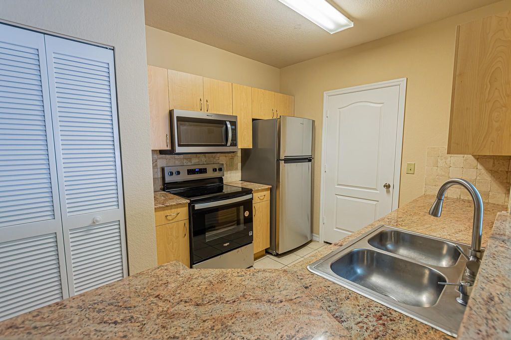 Photo of 166 SW Peacock Boulevard #34-205, Port Saint Lucie, FL 34986 (MLS # R11089480)