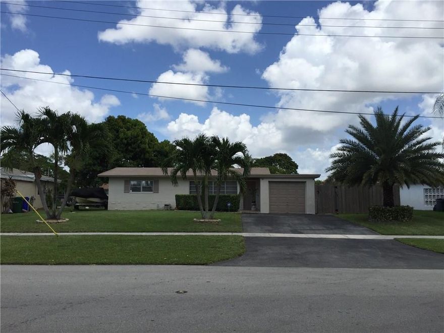 WOW-Very pretty pool home on the canal with dynamite views that go on and on! Tucked away in this central location subdivision near schools, parks, mall, shopping- you name it! Remodeled kitchen, tile floors, remodeled baths-basically move-in condition. Enjoy the tropical, waterfront yard with pool and mango tree. Enjoy the pineapple garden-all fenced in with wide gate on side for stowing boat, work trailers, RV's or anything! Your own Florida paradise is available to purchase RIGHT NOW!