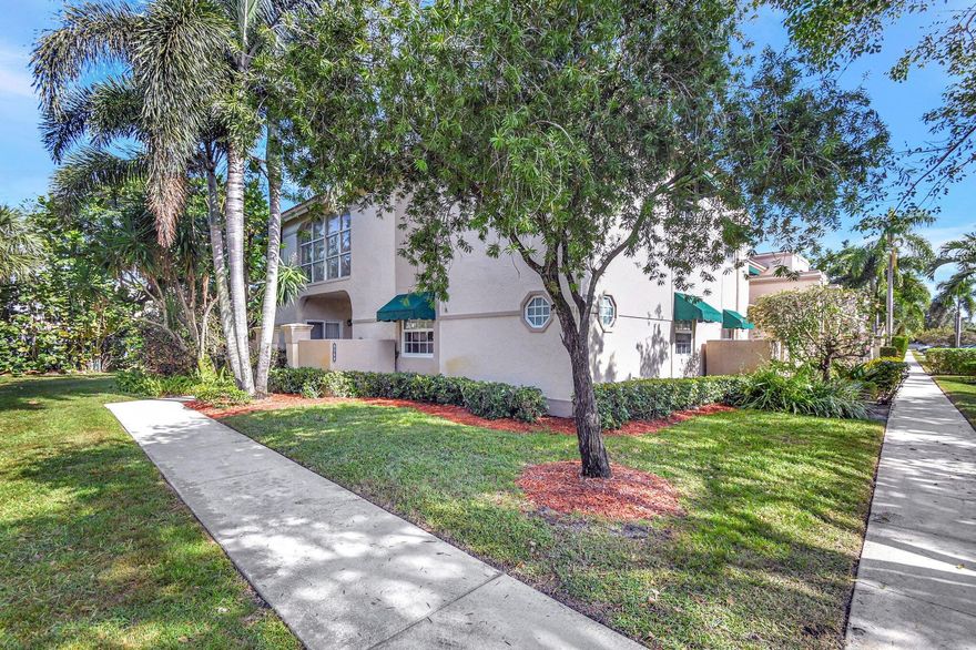 Experience luxury living in this fully renovated 2-bedroom, 2-bath first-floor condo in Plum at Boca Pointe. Every detail has been redone to perfection, creating a truly move-in-ready home. Beautiful wood floors flow throughout, and all windows and doors have been upgraded to impact glass. Brand new A/C !!! The courtyard entrance features an open patio and storage area, while the enclosed patio offers additional living space with peaceful garden views. The kitchen boasts quartz countertops, white cabinets, stainless steel appliances, and a French door fridge. Smooth ceilings, crown molding, updated bathrooms, custom walk-in closets, and a front-loading washer and dryer add to the appeal. Furniture is negotiable--don't miss this rare gem!