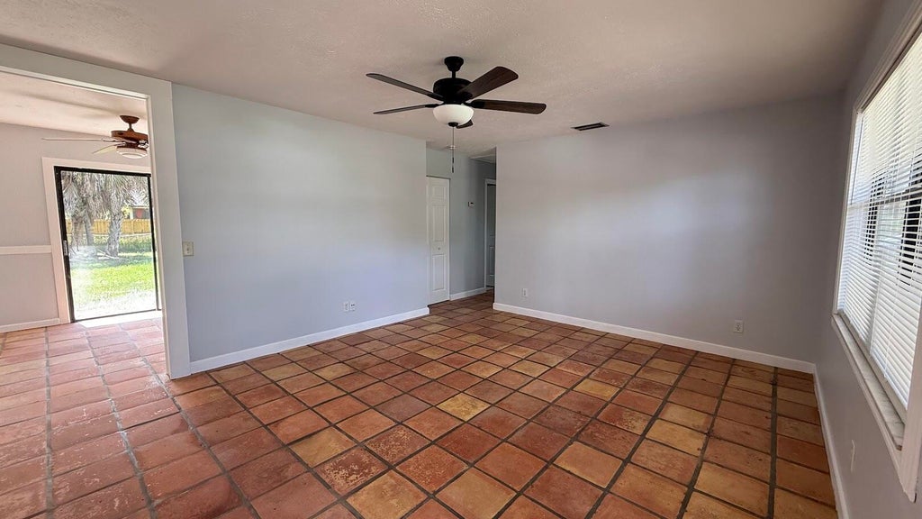 Photo of 2325 SW Pamona Street, Port Saint Lucie, FL 34953 (MLS # B26041814)