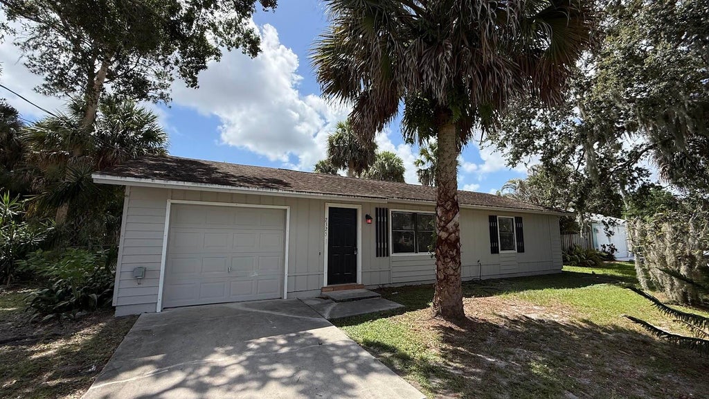 Photo of 2325 SW Pamona Street, Port Saint Lucie, FL 34953 (MLS # B26041814)