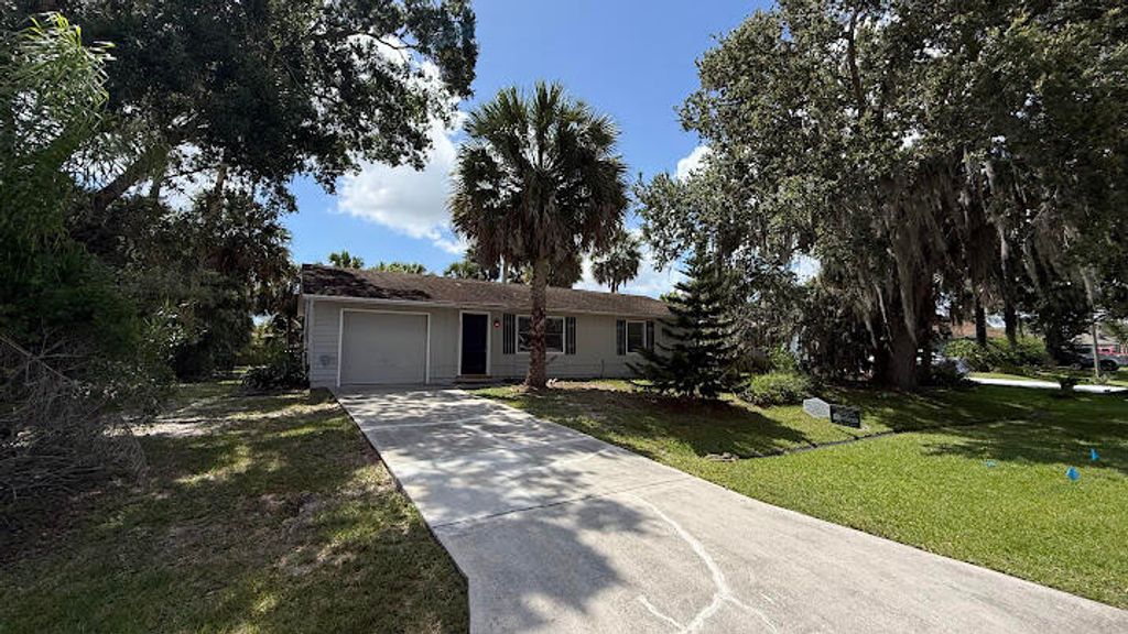 Photo of 2325 SW Pamona Street, Port Saint Lucie, FL 34953 (MLS # B26041814)