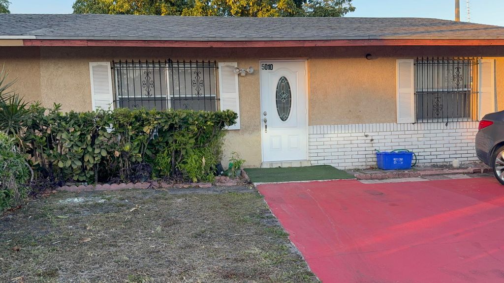 Photo of 5010 Pimlico Court, West Palm Beach, FL 33415 (MLS # R11161196)