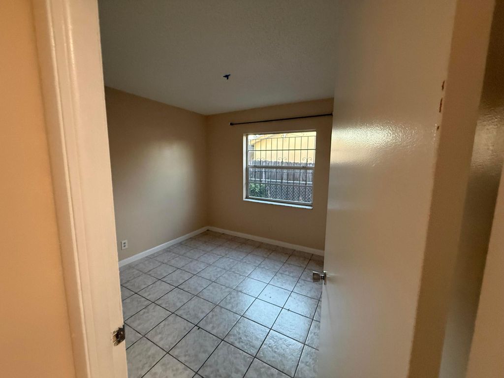 Photo of 5010 Pimlico Court, West Palm Beach, FL 33415 (MLS # R11161196)