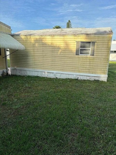 Photo of 86 El Camino Real Real, Port Saint Lucie, FL 34952 (MLS # B26004665)