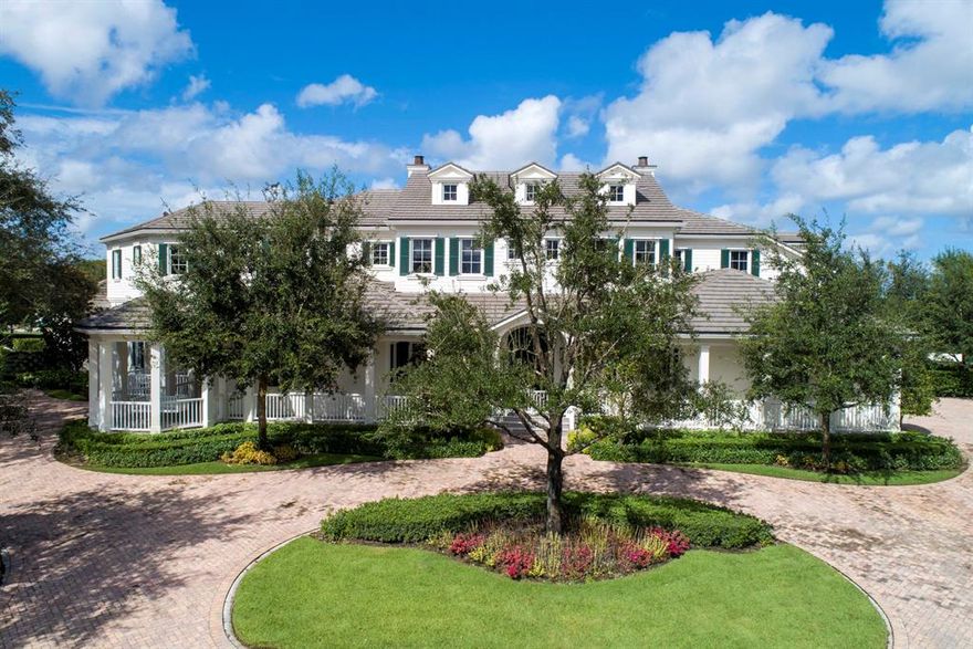 This tailor fit home located on an expansive golf site with beautiful views in Old Marsh is truly one of a kind! This Edgartown and Augusta blend architecture home was built by Maxwell Construction and features three stories, a workout room, game room, a large swimming pool, an open family room and kitchen, and multiple porches perfect for enjoying the South Florida weather. See for yourself why this home is simply a masterpiece!