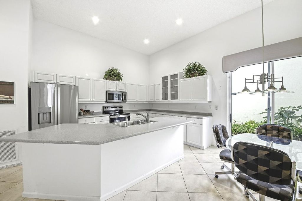 Photo of 7737 Rockford Road, Boynton Beach, FL 33472 (MLS # R11145757)