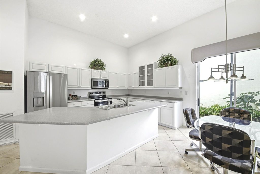 Photo of 7737 Rockford Road, Boynton Beach, FL 33472 (MLS # R11145757)