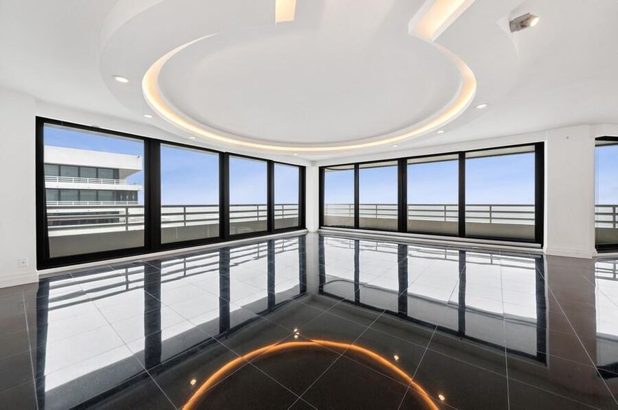 This spectacular 3 bedroom, 3.5 bath, wrap-around corner residence boasts 3,117 sq ft of oceanfront elegance. The moment you enter the grand foyer, you're welcomed with panoramic 15th floor ocean views. The oversized living space overlooks the sparkling Atlantic with a wrap-around balcony & built in bar area, perfect for oceanfront entertaining. The primary suite features contemporary built-ins, plush carpet, custom closets & both ocean & city views. The primary bath has glass enclosed shower, marble details & breathtaking vistas. Each of the 2 guest suites include ensuite baths, custom closets & balcony views. This unit comes with 2 parking spaces, other details in this residence include designer lighting, sleek flooring and impact glass windows.(more)