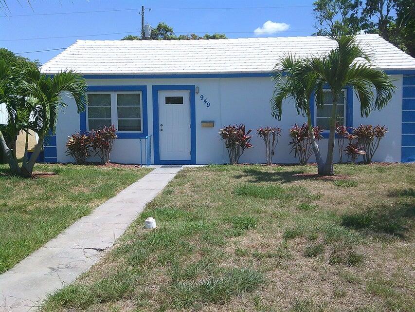 This is a single family home with a large yard - This house has underground wiring to the house - impact windows and doors - newer roof - complete with a washer and dryer - all tile - very clean and in excellent repair - New paint -Quiet neighborhood - lots of parking on a long driveway - no kitties please - no association and a fast move in -close to everything