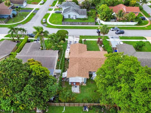 Tiny photo for 703 SW 76th Avenue, North Lauderdale, FL 33068 (MLS # B26050347)