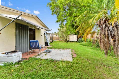 Tiny photo for 703 SW 76th Avenue, North Lauderdale, FL 33068 (MLS # B26050347)